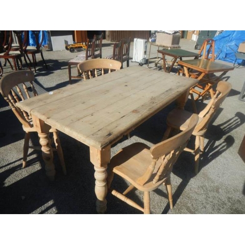 42 - A antique pine table and 4 chairs