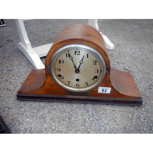 63 - A mantel clock (missing glass)