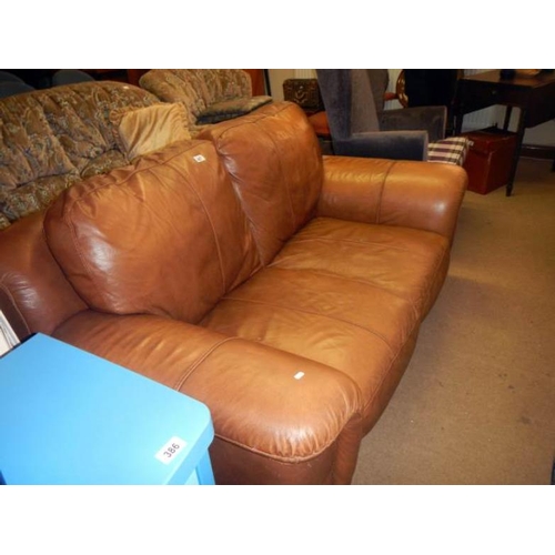 487 - A 2 seater leather sofa