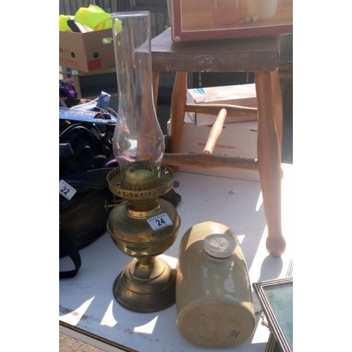 24 - An oil lamp & stone water bottle