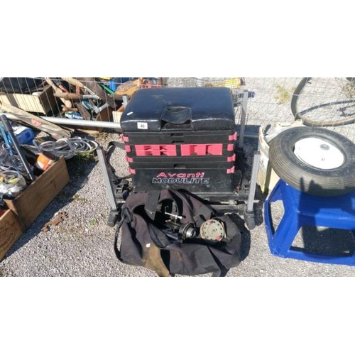 40 - A fishing box/seat & reels etc.