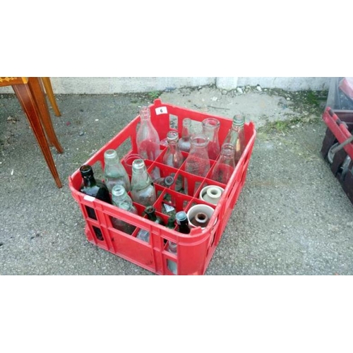 6 - A quantity of glass bottles