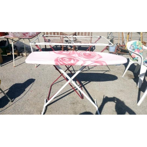 60 - An ironing board & airer