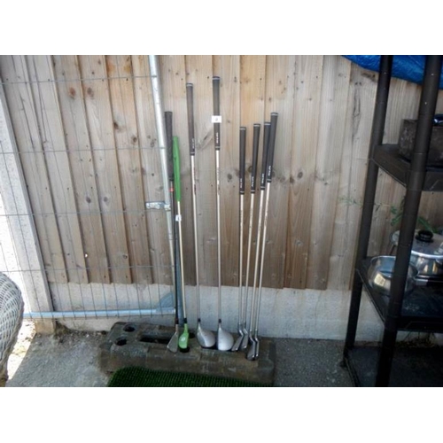 9 - A quantity of golf clubs