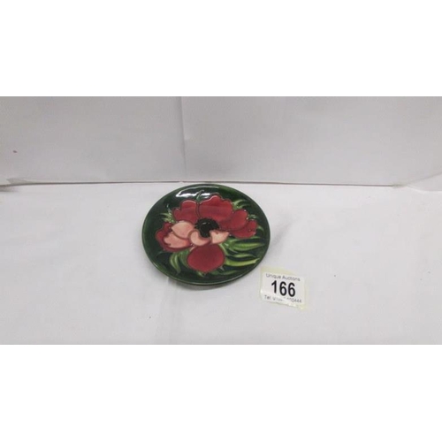 166 - A boxed Moorcroft Anemone tribute pin dish