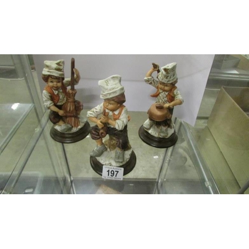 197 - 3 figurines of child musicians