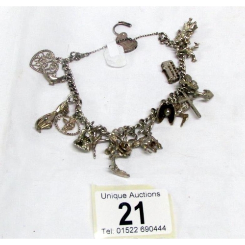 21 - A silver charm bracelet