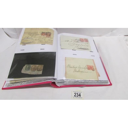 234 - An album of 19th century Victoria British and Empire stamps including postal stamps, fiscals, entire... 