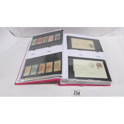 234 - An album of 19th century Victoria British and Empire stamps including postal stamps, fiscals, entire... 