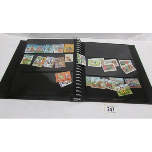 247 - An album of mainly mint Disney stamps, Angilla, Belize, Dominica, Grenada etc, mainly in sets