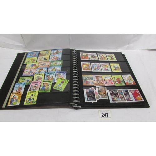 247 - An album of mainly mint Disney stamps, Angilla, Belize, Dominica, Grenada etc, mainly in sets