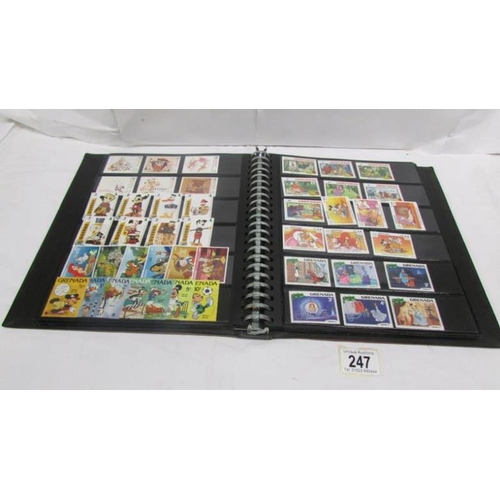 247 - An album of mainly mint Disney stamps, Angilla, Belize, Dominica, Grenada etc, mainly in sets