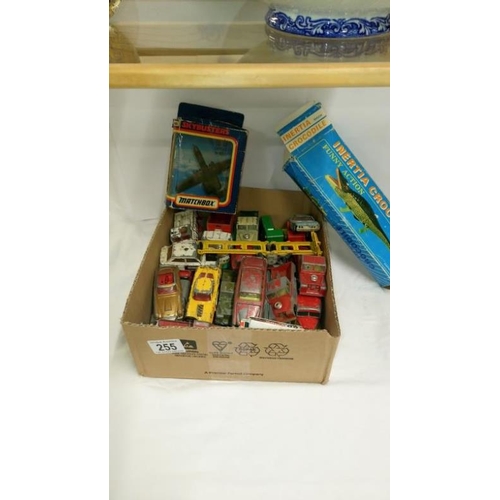 255 - A box of play worn diecast, mainly Corgi including Batmobile, James Bond Aston Martin, tinplate croc... 