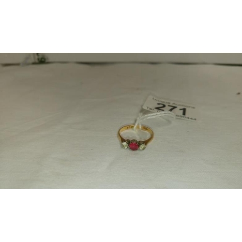 271 - An 18ct gold ring with ruby and diamonds, HM 18ct