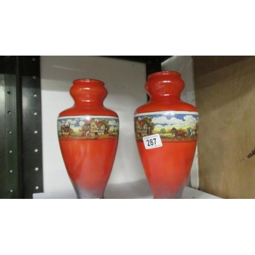 287 - A pair of 1930's Kew vases with coaching scenes