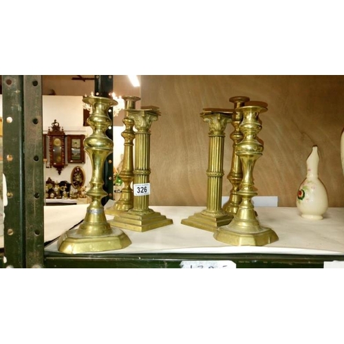 326 - 3 pairs of brass candlesticks