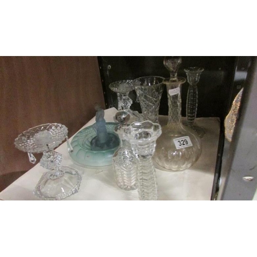 329 - A mixed lot of glass ware including candlesticks