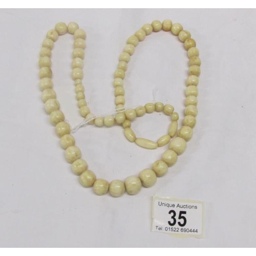 35 - An ivory bead necklace