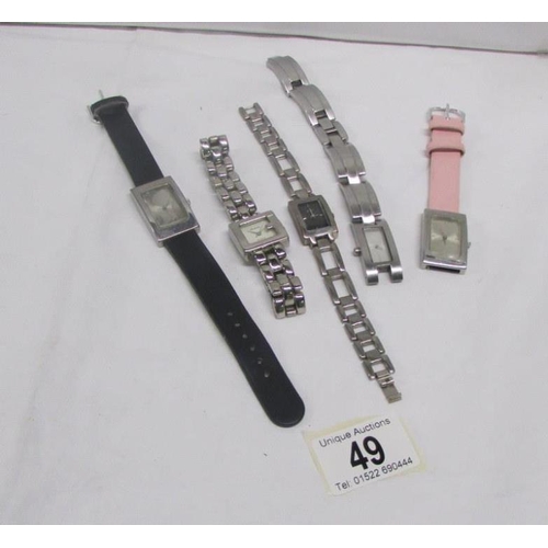 49 - 5 wristwatches including Gucci, DKNY etc