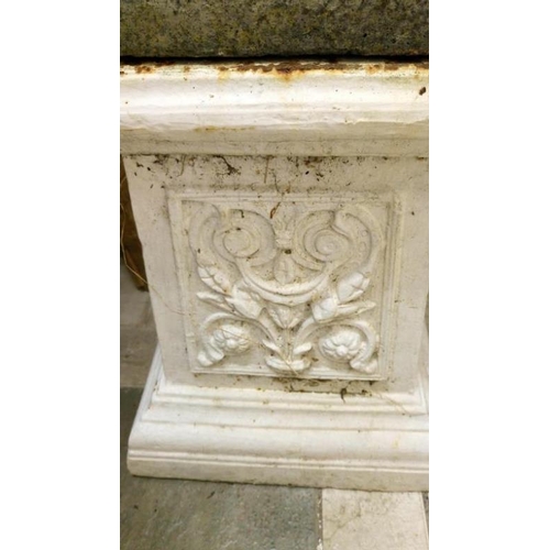 631 - A pair of garden lions on pedestals & holding shields