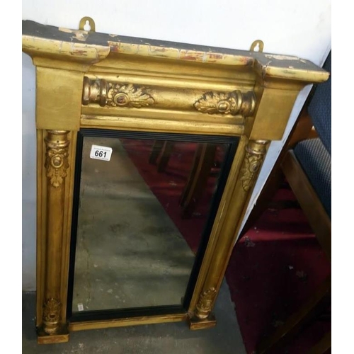 661 - A gilt framed Palladian style mirror