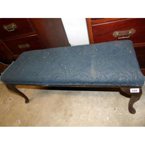 680 - A long stool with upholstered top