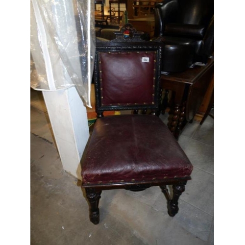 684 - A 19th century chair with leather seat and back