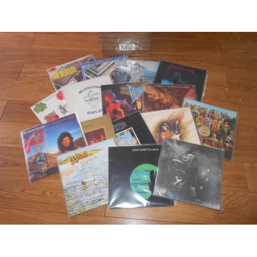 390 - A box of approximately 60 progressive and classic rock LP records including Beatles, Led Zeppelin, E... 