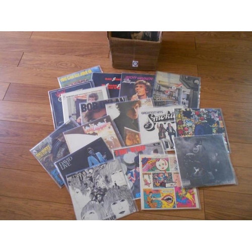 352 - A box of apporximately 60 rock and folk LP records including The Beatles, The Who, David Bowie, Blac... 