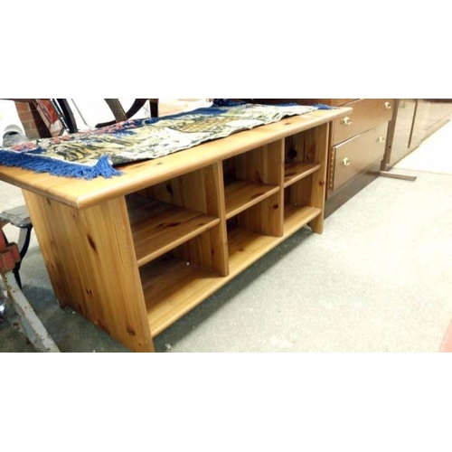 174 - A large coffee table with shelves