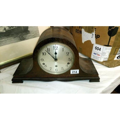 214 - A oak mantle clock