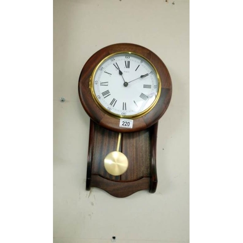 220 - A Tempora quartz mahogany wall clock