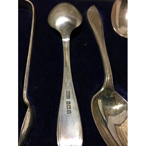 57 - A cased set of silver teaspoons with sugar tongs, 2 silver mustard spoons together with salt and pep... 