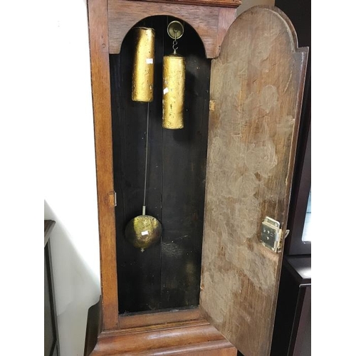 643 - A 19th century oak long cased clock. J. Crofts, Newbury