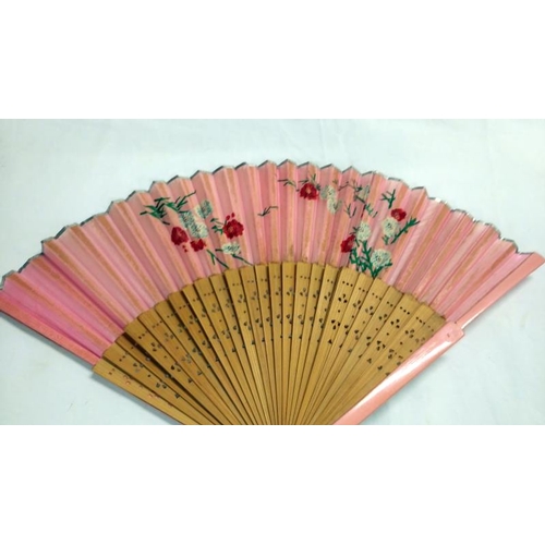 200 - A collection of mainly Chinese and hand painted fans, approximately 20