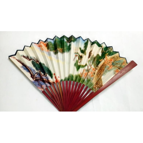 200 - A collection of mainly Chinese and hand painted fans, approximately 20