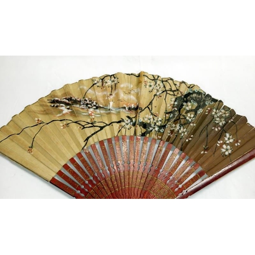 200 - A collection of mainly Chinese and hand painted fans, approximately 20