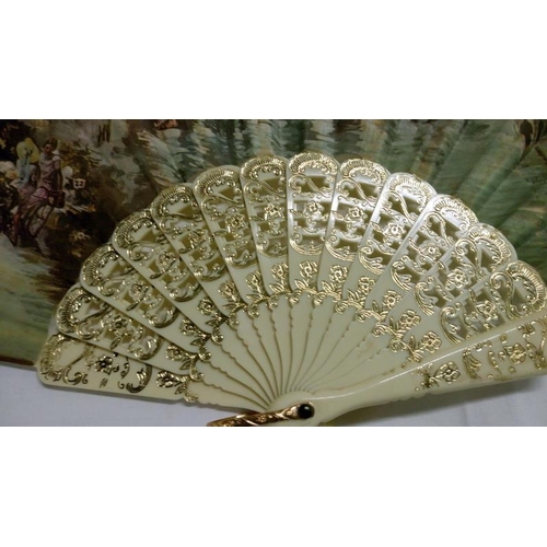 200 - A collection of mainly Chinese and hand painted fans, approximately 20