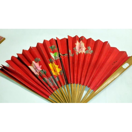 200 - A collection of mainly Chinese and hand painted fans, approximately 20