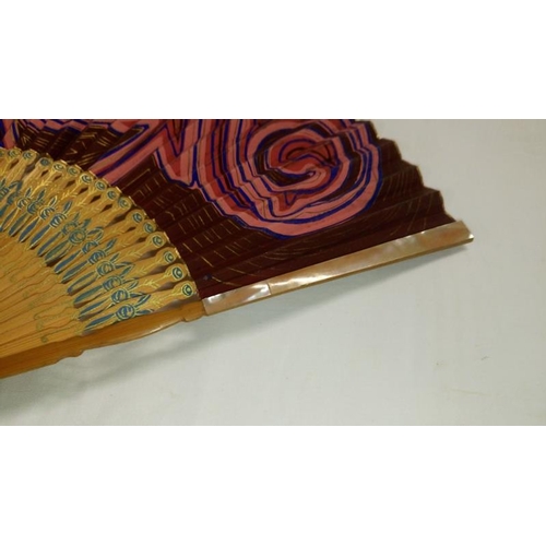 200 - A collection of mainly Chinese and hand painted fans, approximately 20