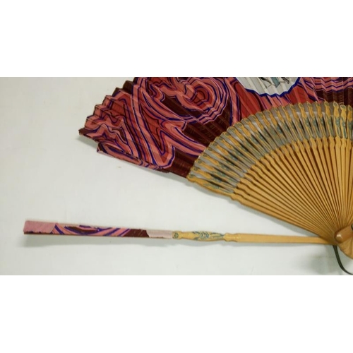 200 - A collection of mainly Chinese and hand painted fans, approximately 20