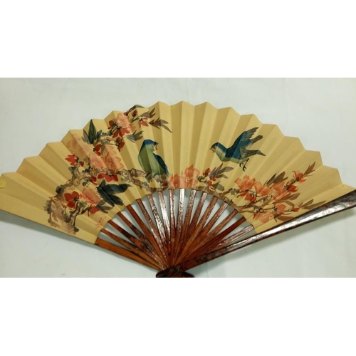 200 - A collection of mainly Chinese and hand painted fans, approximately 20