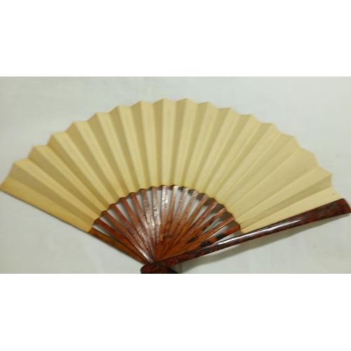 200 - A collection of mainly Chinese and hand painted fans, approximately 20