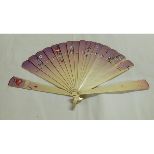 200 - A collection of mainly Chinese and hand painted fans, approximately 20