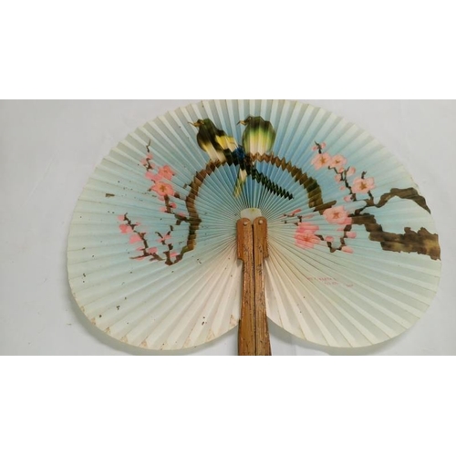 200 - A collection of mainly Chinese and hand painted fans, approximately 20