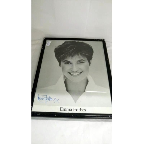 201 - A collection of celebrity photographs including signatures from Philip Schofield, Chas and Dave, Ter... 