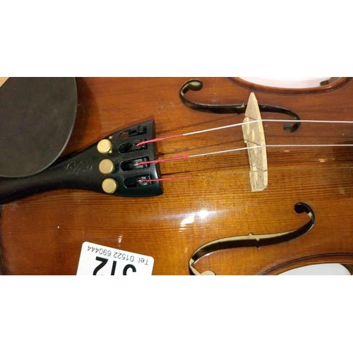 512 - A violin & bow with case, label reads 'The Stentor Student II'