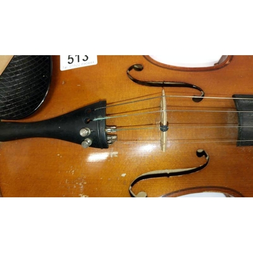 513 - A violin & 2 bows in case, label reads 'Piena student violin, model Antonius Stradivarius