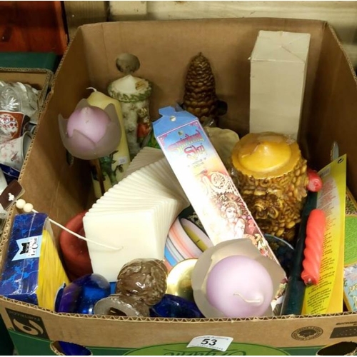 53 - A box of candles & holders etc.