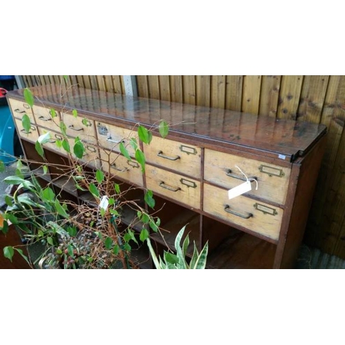 10D - A 12 drawer wooden unit